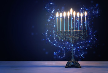 Religion image of jewish holiday Hanukkah background with menorah (traditional candelabra) and candles