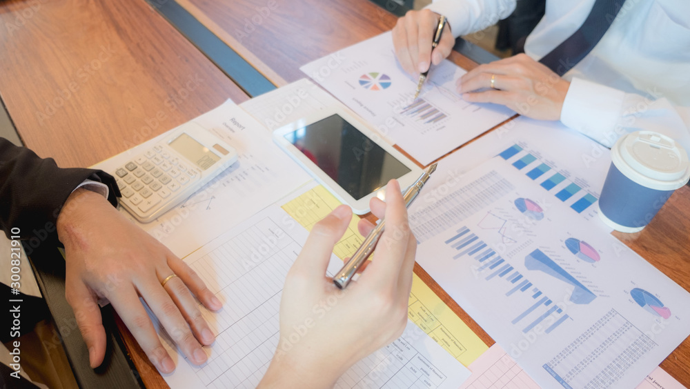 Businessmen, financial accountants, business planners, business planning ideas using computers, laptops, smat phones, and work calculators Businessmen, financial accountants, business planners, business planning ideas using computers, laptops, smat phones, and work calculators