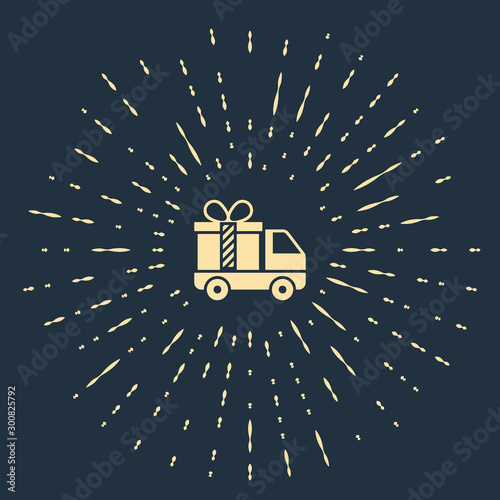 Beige Delivery truck with gift icon isolated on dark blue background. Abstract circle random dots. Vector Illustration