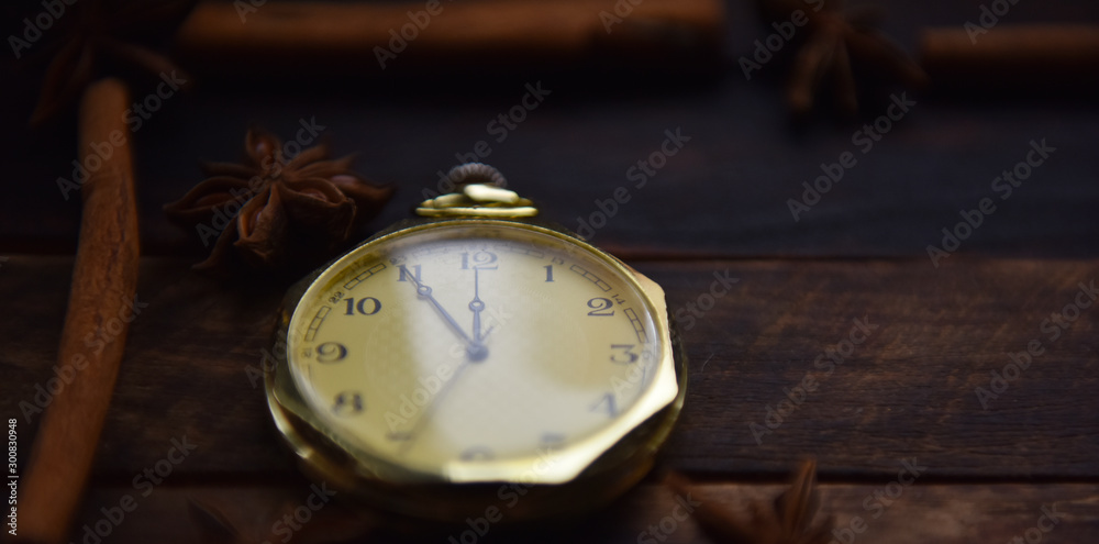 Christmas still life orange cinnamon pocket watch