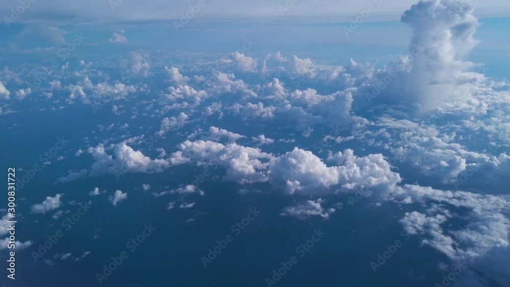 White clouds formation in the middle of the vast Ocean.