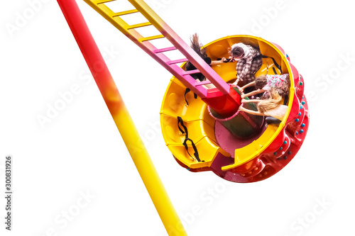 Pendulum swing ride in an amusement park and a cabin with cheerful children tends high to the highest point isolated on white background
