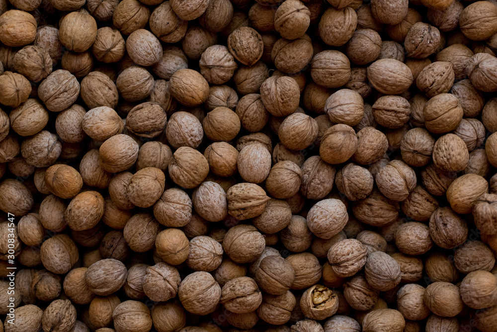 background a lot of walnuts closeup background a lot of walnuts closeup