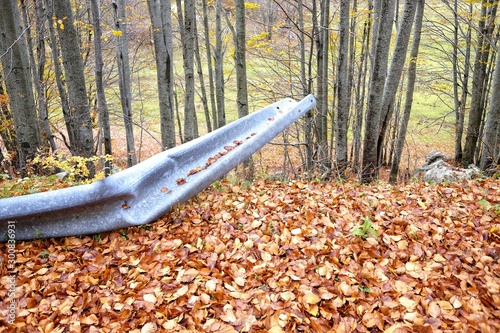 guardrail torn in the mountain road photo