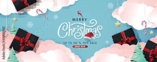 Christmas composition in paper cut style sale banner background.Merry Christmas text Calligraphic Lettering Vector illustration.