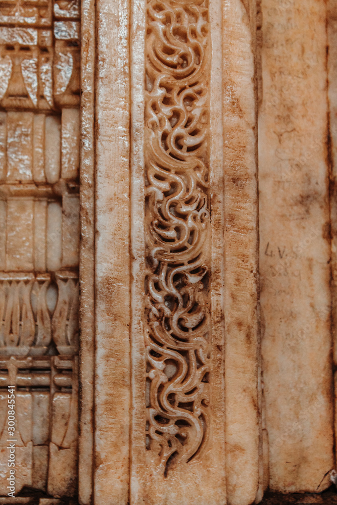 Junagadh, Gujarat, India - circa 2019: View of the ancient carvings inside the Uparkot fort