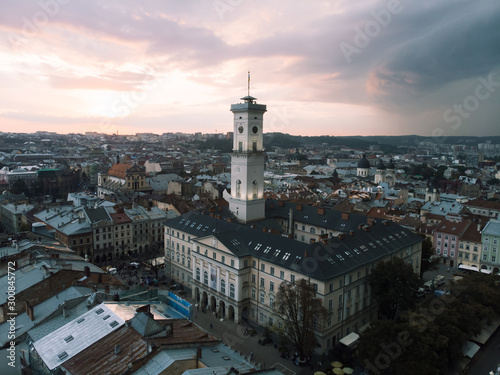 aerial view of lviv bell clock tower on sunset overcast sky