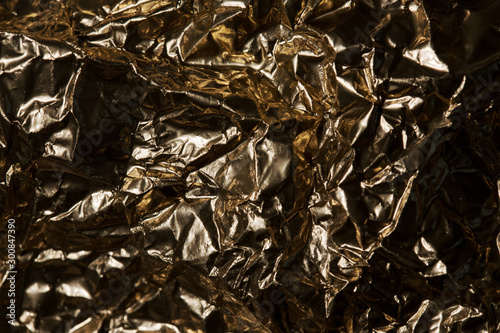 Golden grunge texture. Vintage abstract golden background for your design. Luxury golden background. Shiny golden texture.