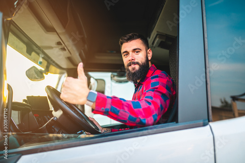 Truck driver preparing for the next destination photo
