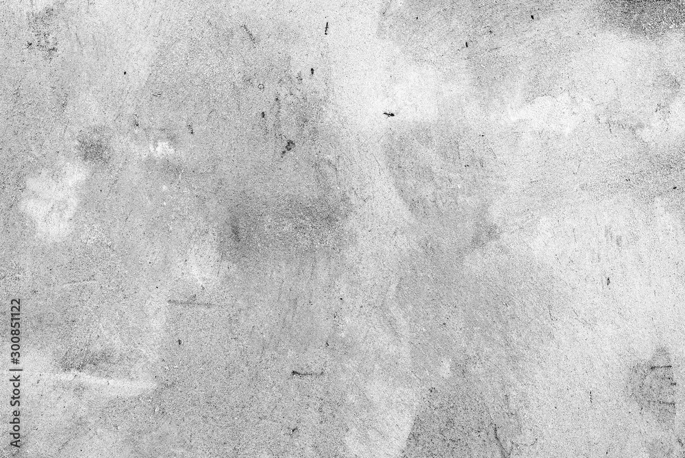 Texture of a concrete wall with cracks and scratches which can be used as a background - obrazy, fototapety, plakaty 