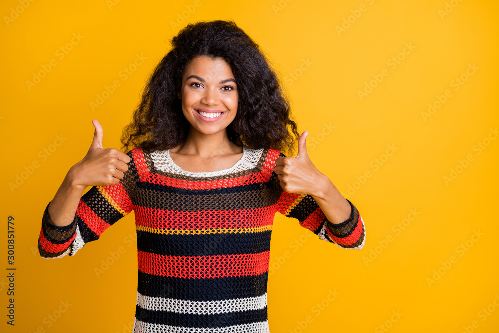 Portrait of her she nice attractive content cheerful cheery wavy-haired girl in knitted sweater showing double thumbup ad advert isolated on bright vivid shine vibrant yellow color background Portrait of her she nice attractive content cheerful cheery wavy-haired girl in knitted sweater showing double thumbup ad advert isolated on bright vivid shine vibrant yellow color background