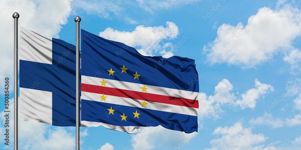 Finland and Cape Verde flag waving in the wind against white cloudy blue sky together. Diplomacy concept, international relations.