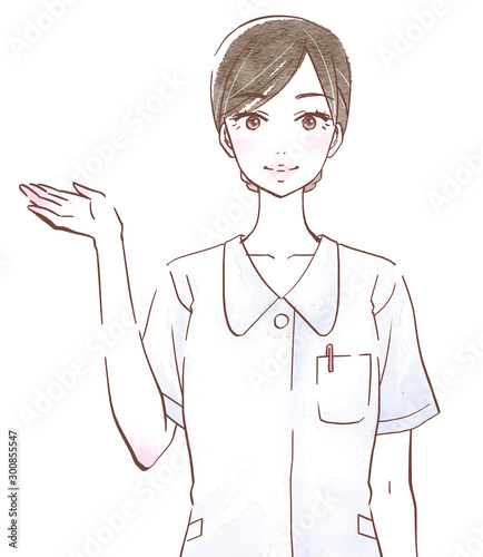 ナース服を着て右手で案内する若い女性