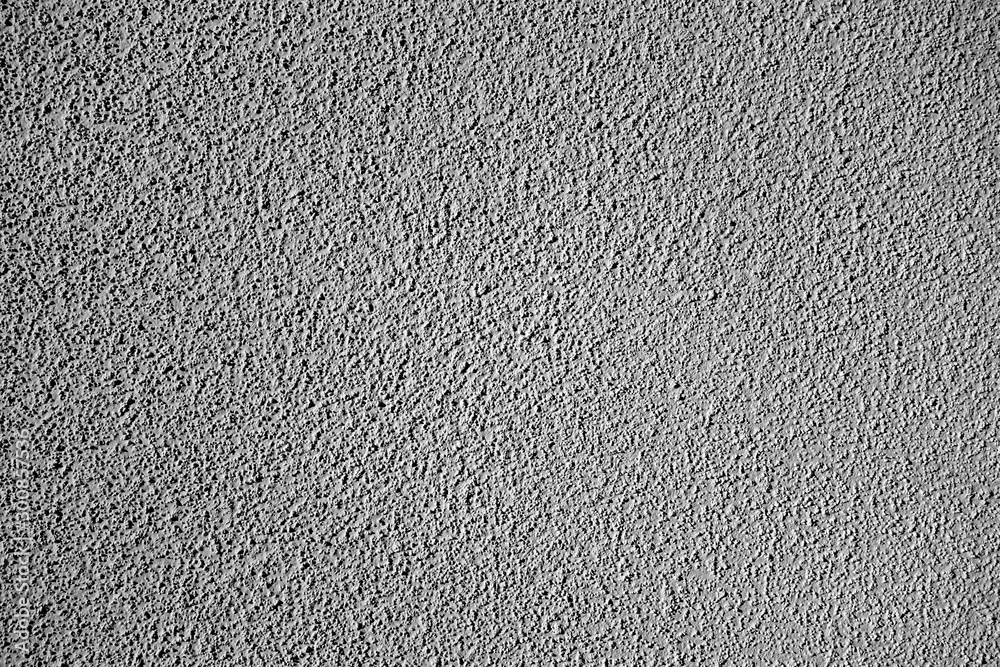Grungy cement wall texture in black and white. Grungy cement wall texture in black and white.