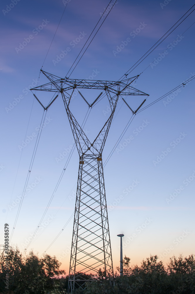 Electric line at sunset