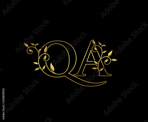 Gold letter Q and A, QA vintage decorative ornament emblem badge, overlapping monogram logo, elegant luxury gold color on black background.