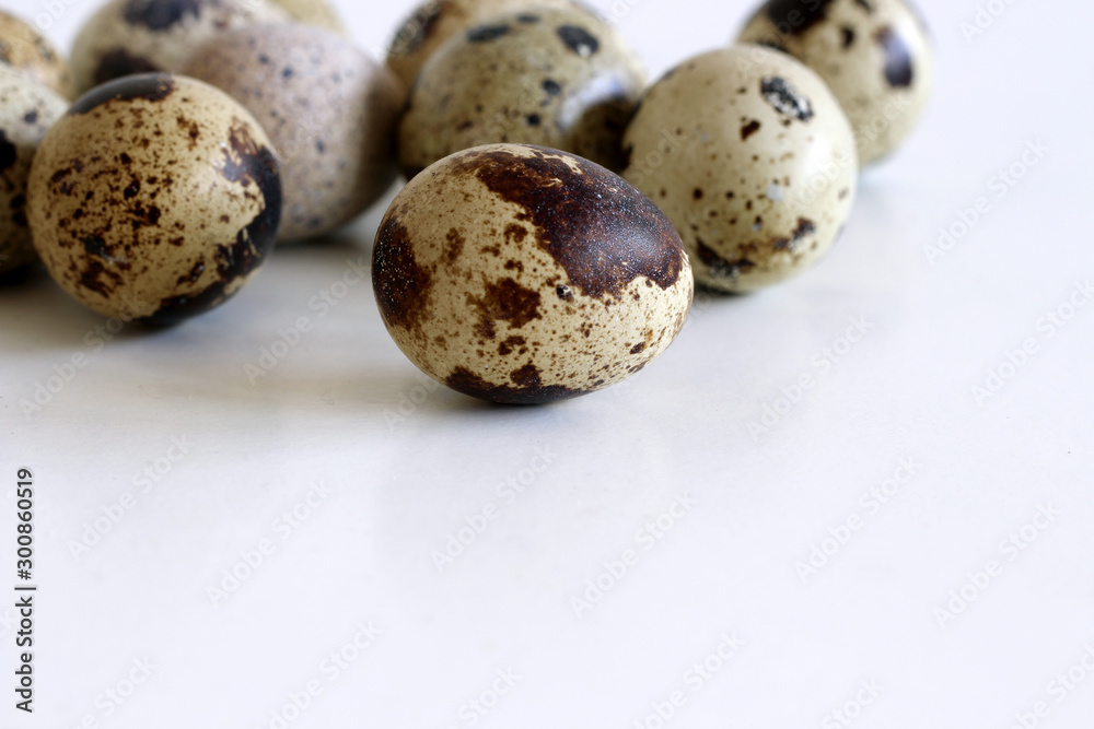 Isolated quail eggs on white background. Food concept.Quail eggs are smaller than chicken, yet they have 2.5 times more vitamin A. Isolated quail eggs on white background. Food concept.Quail eggs are smaller than chicken, yet they have 2.5 times more vitamin A.