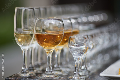 Many different glasses on the wedding table