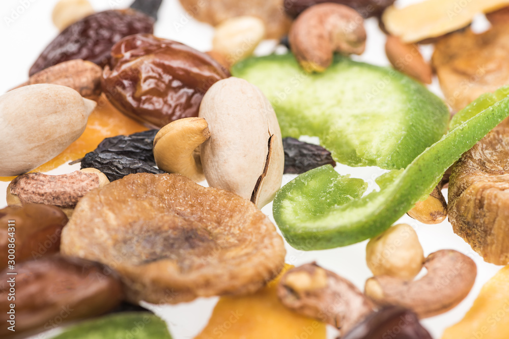 close up view of Turkish assorted nuts, dried fruits and candied fruit isolated on white close up view of Turkish assorted nuts, dried fruits and candied fruit isolated on white