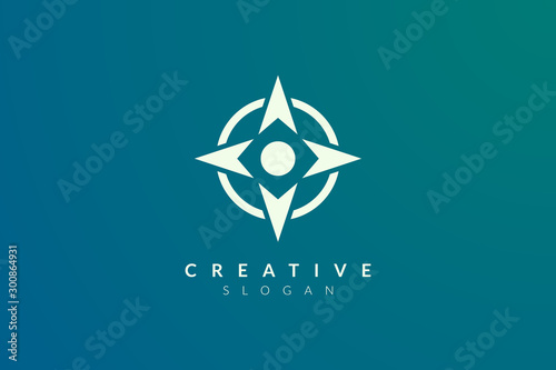 Compass. The logo design is a blend of circles with the direction of the arrow. Minimalist and modern vector illustration design suitable for business and brands