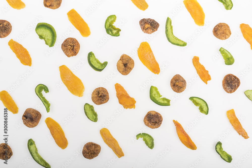 top view of assorted dried fruits and candied fruit isolated on white top view of assorted dried fruits and candied fruit isolated on white