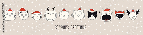 Hand drawn card, banner with different cute cats faces in Santa Claus hats, text Seasons greetings. Vector illustration. Line drawing. Isolated objects. Design concept for Christmas print, invite.