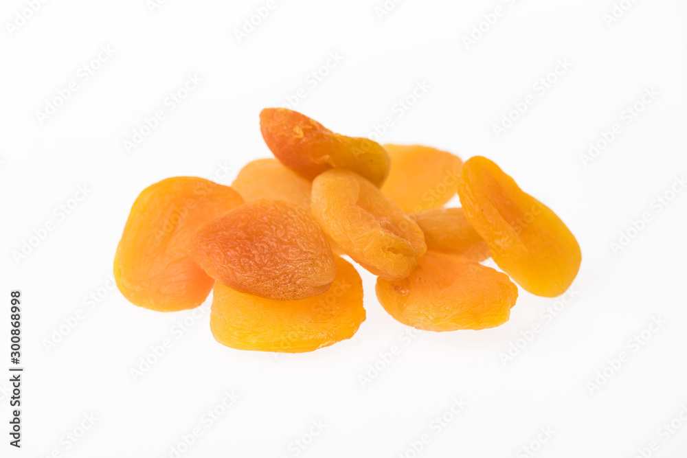 heap of delicious dried apricots isolated on white heap of delicious dried apricots isolated on white