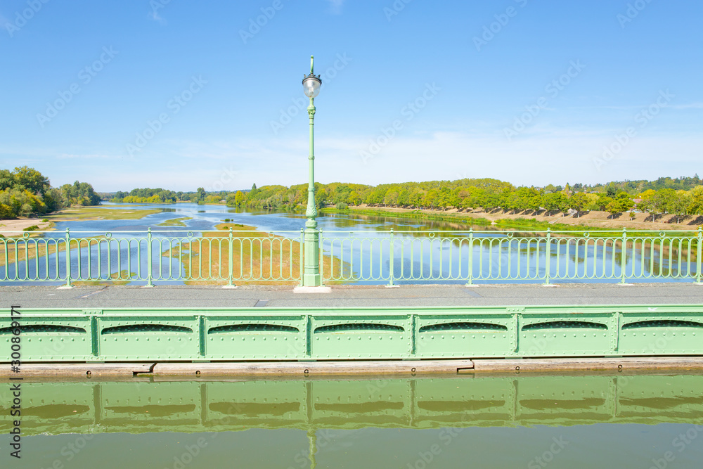 Naklejka premium The historic Pont de Briare in over the river Loire in Centre-Val de Loire, France