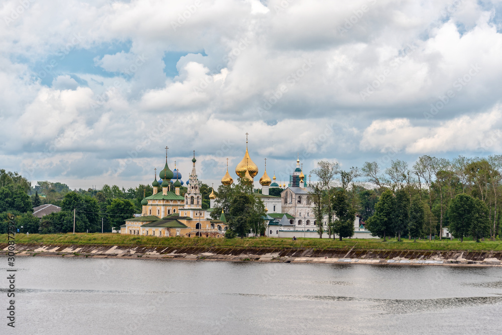 The view of the resurrection Cathedral and the Cathedral of St. John the Baptist from the Volga river in the ancient town of Uglich, Yaroslavl region, Russia