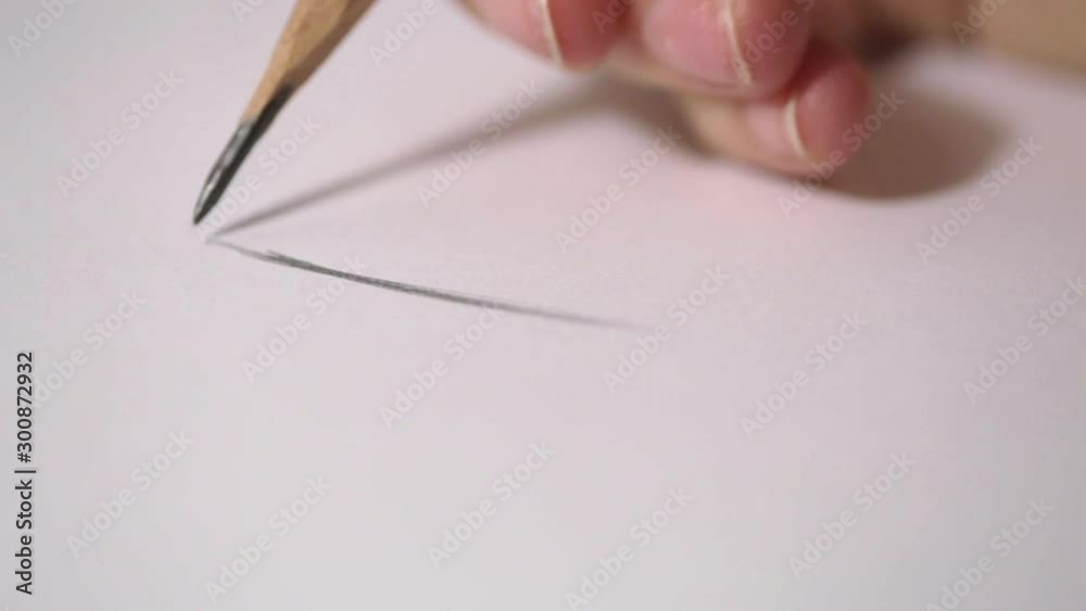 Artist holding wooden pencil in hand drawing on white watercolor paper. Close up sketch footage FHD 1080p Artist holding wooden pencil in hand drawing on white watercolor paper. Close up sketch footage FHD 1080p