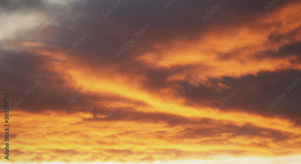  Dense orange clouds during sunrise.