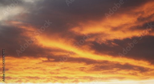 Dense orange clouds during sunrise. © Anna