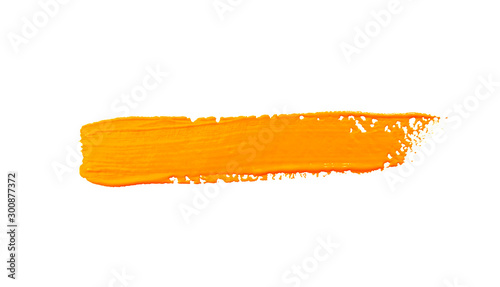 Paint brush stroke texture ochre yellow watercolor isolated on a white photo