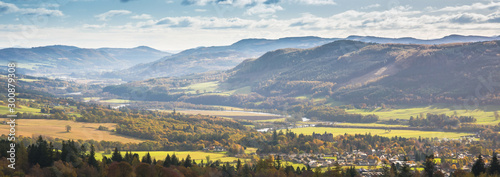 Tummel River meandering between hills near Pitlochry in Perthshire, Scotland on a sunny autumn day
