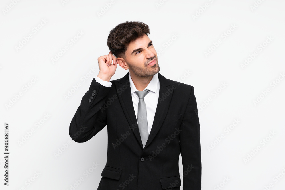 Young businessman over isolated white background having doubts and with confuse face expression Young businessman over isolated white background having doubts and with confuse face expression