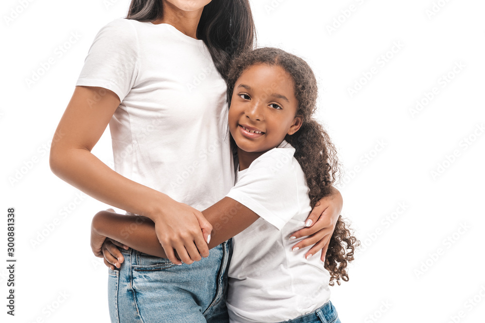 african american child hugging mother and looking at camera isolated on white