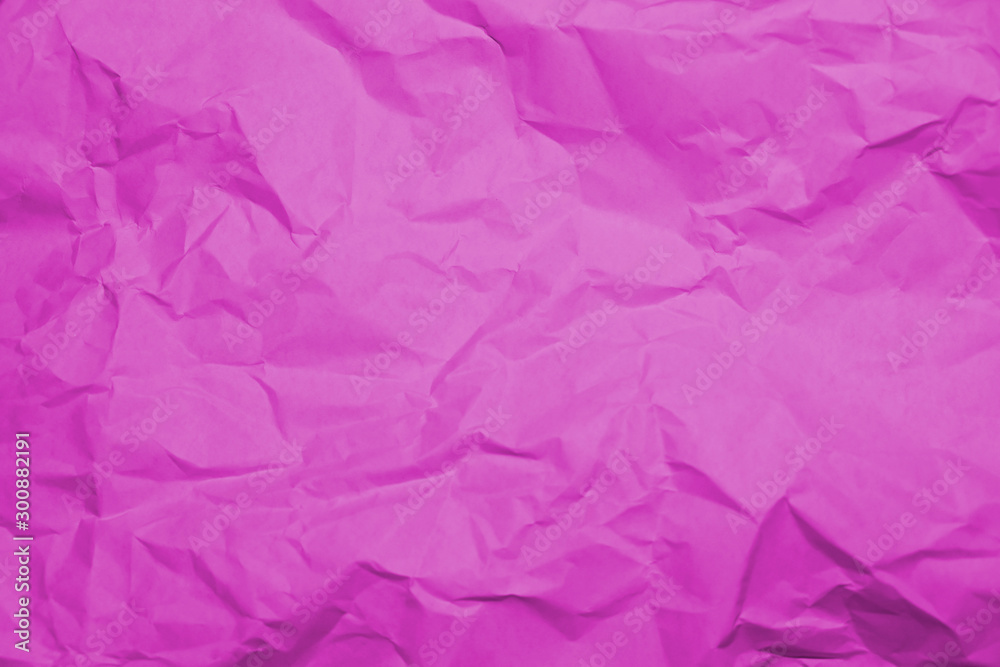 Crumpled recycle pink paper background - Pink paper crumpled texture - Pink paper wrinkled background.