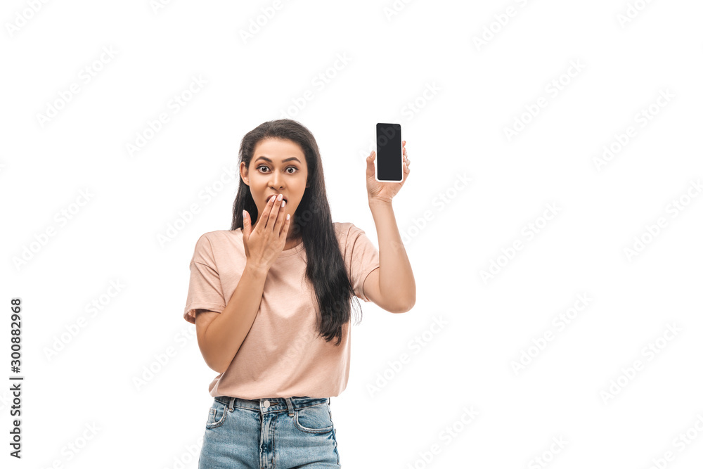 shocked african american woman holding smartphone with blank screen and covering mouth with hand isolated on white shocked african american woman holding smartphone with blank screen and covering mouth with hand isolated on white