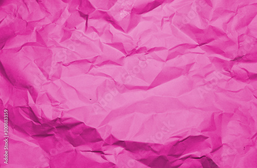 Crumpled recycle pink paper background - Pink paper crumpled texture - Pink paper wrinkled background.