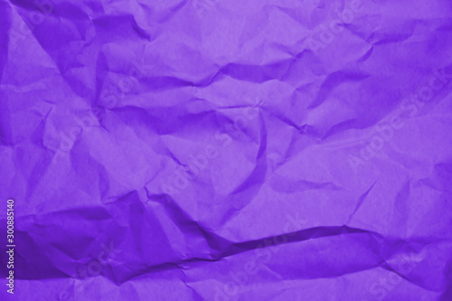 Сrumpled paper texture purple. Texture of crumpled paper. Crumpled paper. Wrinkles paper.
