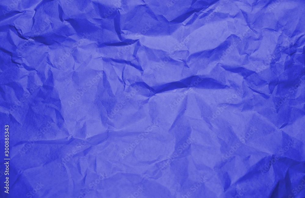 Fototapeta premium Blue crumpled paper texture background.