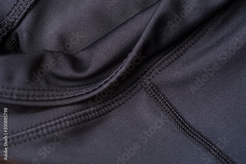 Close-up fragment of black nylon garment