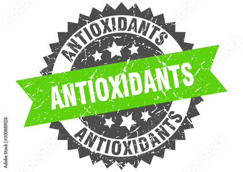 antioxidants grunge stamp with green band. antioxidants