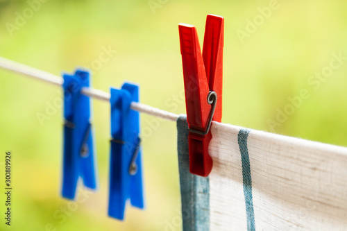 Plastic clothespins on a rope. Towel drying