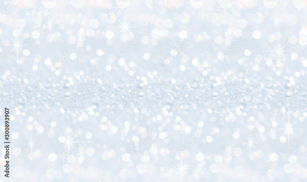Winter christmas sparkling shiny silver bright glittering abstract bokeh background
