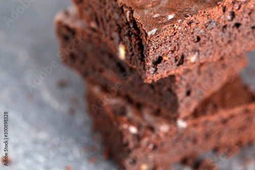 Vegan brownies chocolate plant based diet no animal products on dark background