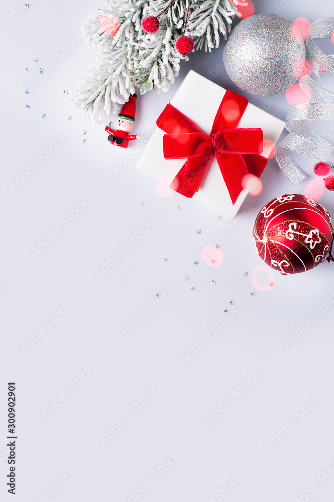Christmas gift box flat lay on white background with decoration. Christmas gift box flat lay on white background with decoration.