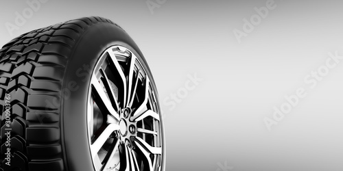 Wheel with modern alu rim on white background photo