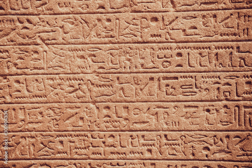 old egypt hieroglyphs carved on the stone Fototapet