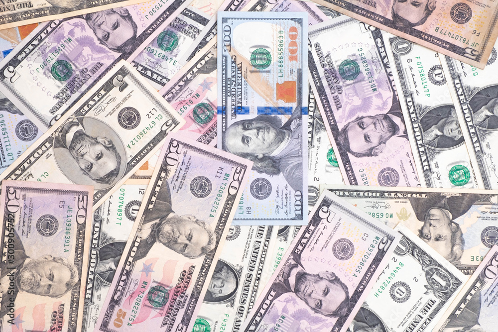 Money background with different dollar banknotes Money background with different dollar banknotes